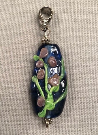 PURPLE FLOWERS ON NAVY BLUE GLASS PENDANT WITH BAIL
